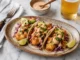 Plato con tacos de pescado estilo Baja California