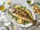 Plato con una lobina al horno