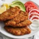 Milanesas de Res Empanizadas: un clásico que siempre funciona Milanesas de res empanizadas doradas y crujientes